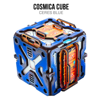 A futuristic metallic cube container labeled 'COSMICA CUBE' with 'ALTAIR BLUE' text above it, shown on a plain white background. The cube is primarily bright blue with orange glowing accents and dark gray structural details.
