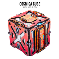 The cube is primarily red-orange with black structural framing and small blue accents.